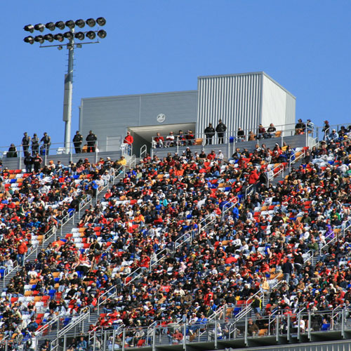 A crowd at a race track A crowd at a race track