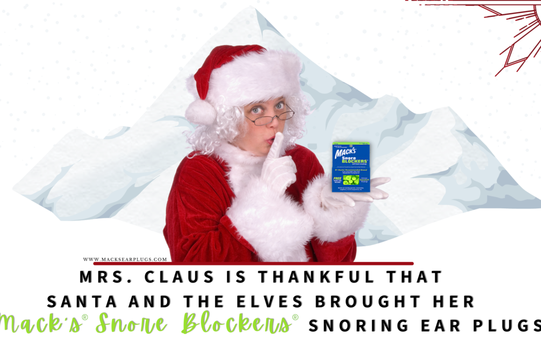 Mrs claus holding a package of macks earplugs snore blockers which are soft foam snoring ear plugs to help with sleeping