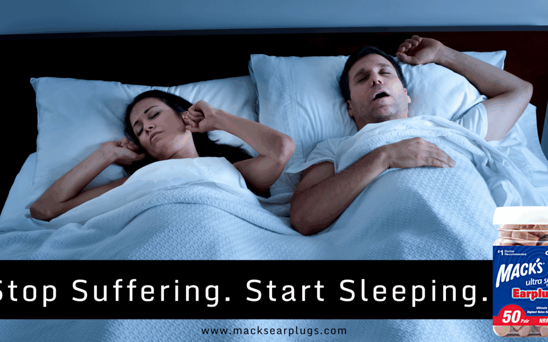 Married couple sleeping and the husband is snoring really loud annoying the wife. Macks ultra soft foam earplugs featured helping block noise from snoring