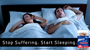 Married couple sleeping and the husband is snoring really loud annoying the wife. Macks ultra soft foam earplugs featured helping block noise from snoring
