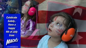 Children celebrating the 4th of July safely and protecting their hearing with Mack's Earmuffs