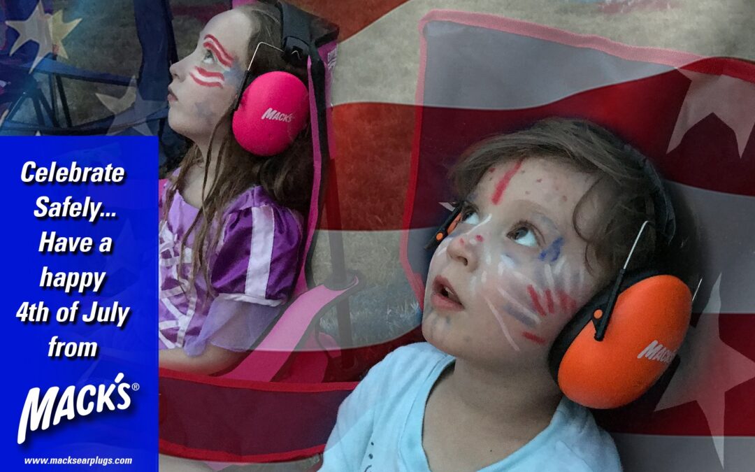 Young boy wearing orange Mack’s earmuffs and young girl wearing pink mack’s ear muffs to protect their hearing on the 4th of july fireworks